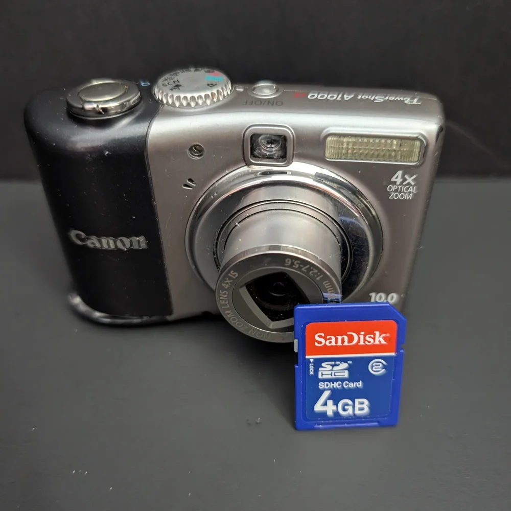Canon PowerShot A1000 IS PC1309 10 MP optical zoom camera FOR PARTS ONLY 22026D4